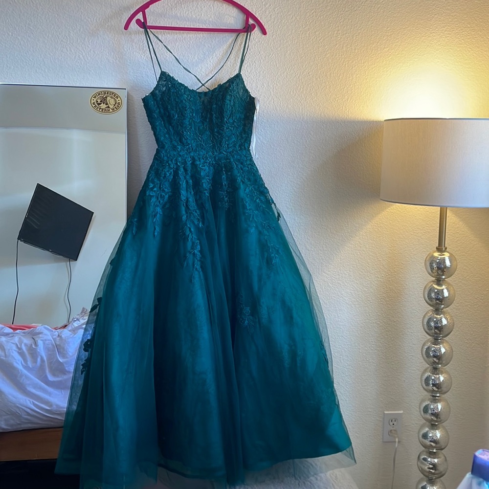 This is a green dress only worn once